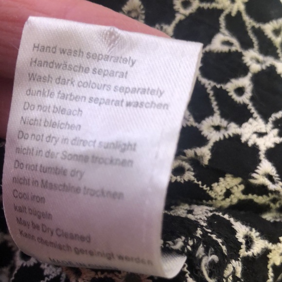 WRAP London black & white button close dress with open front pockets.  Size 18. - Picture 10 of 11